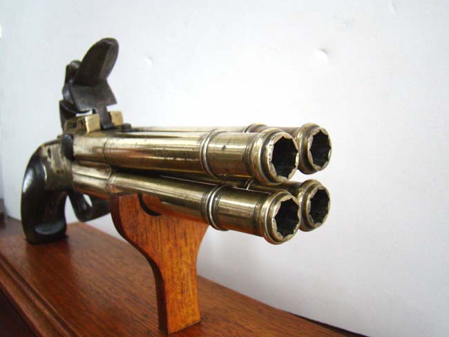 A Unique large 18th century brass barrel tap action four barrel flintlock volley pistol — image 2